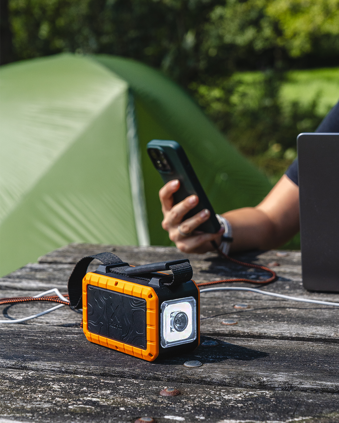 Xtorm Rugged Flashlight Powerbank 40.000 100W- Torch Outdoor Action Black/Orange - Product in Use